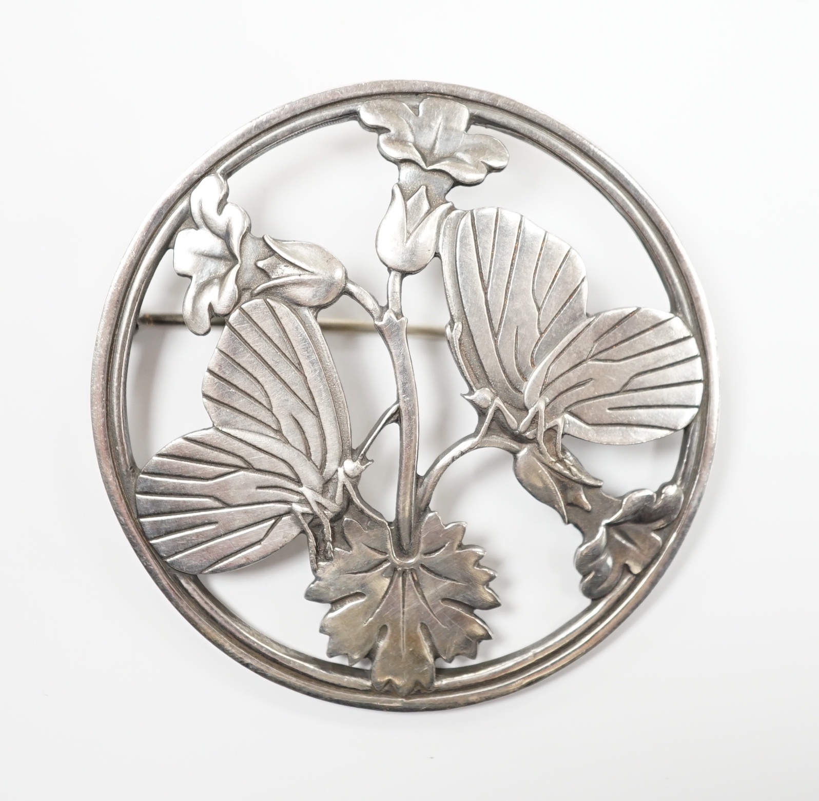 A George Jensen sterling ' butterflies amid foliage' circular brooch, design no. 283, 52mm.